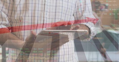 Businessman Tapping Tablet with Financial Charts and Rising Red Arrow for Trading