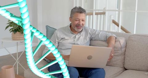 Middle-aged man working on laptop at home with teal dna helix overlay for telehealth