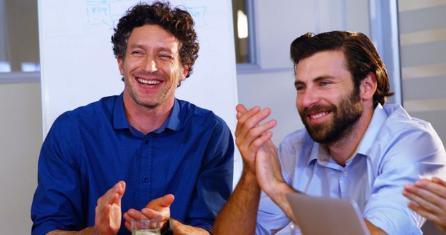 Colleagues Applauding During Office Meeting in Modern Workplace - Download Free Stock Images Pikwizard.com