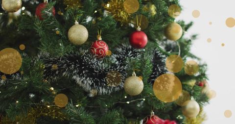 Christmas Tree with Baubles and Digital Festive Spots - Download Free Stock Images Pikwizard.com