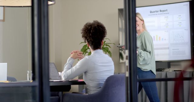 Diverse professionals discussing quarterly report in modern office - Download Free Stock Images Pikwizard.com