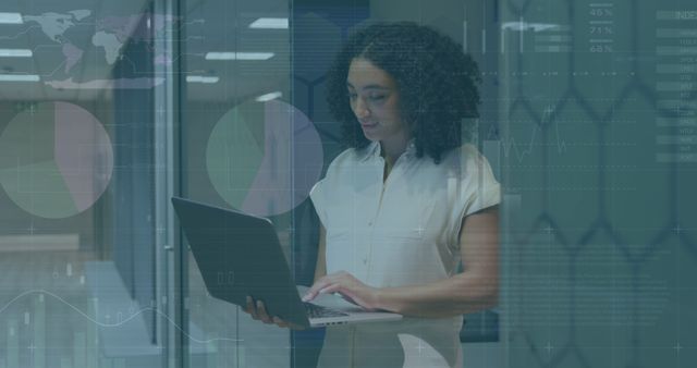 Business Woman Analyzing Data on a Laptop in Modern Office - Download Free Stock Images Pikwizard.com