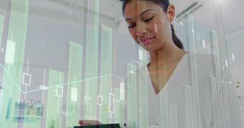 Businesswoman Analyzing Stock Market Data on Digital Tablet in Modern Office