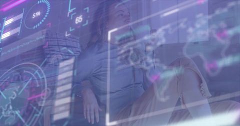 Contemplative woman sipping mug on couch with futuristic holographic data overlay and ambient charts