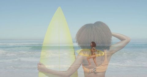 Artistic Double Exposure of Woman Surfing at Beach