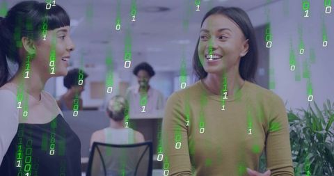 Colleagues talking and collaborating in modern office with green binary code overlay