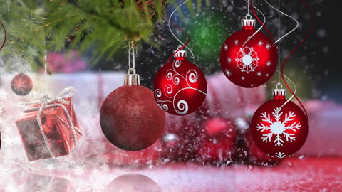 Festive Red Baubles and Gift Under Snowy Christmas Tree