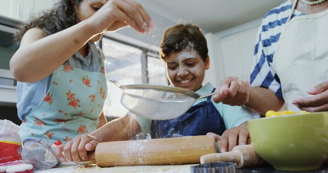 Family Baking Together in Home Kitchen Covered in Flour Smiling - Download Free Stock Images Pikwizard.com