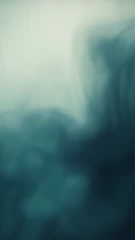 Drifting Teal Plume Rising in Clear Tank Backlit Wispy Diffusion Abstract Vertical Video Loop