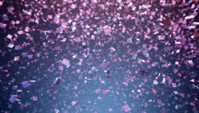 Dazzling pink metallic cubes creating confetti effect