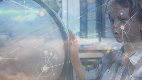 Curious Schoolboy Exploring Globe and Digital Network Connections