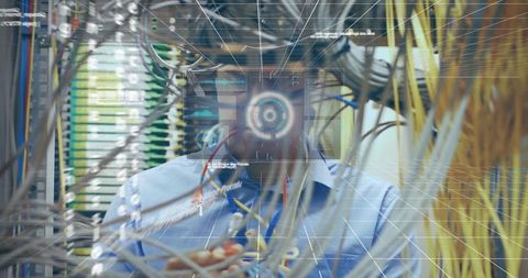 Man Analyzing Data in High-Tech Server Room with Virtual Interface - Download Free Stock Images Pikwizard.com