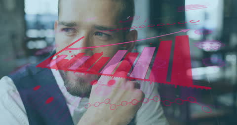 Businessman Analyzing Financial Data with Graph Overlay