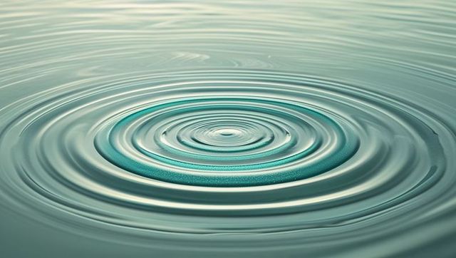 Serene turquoise water ripples reflecting light