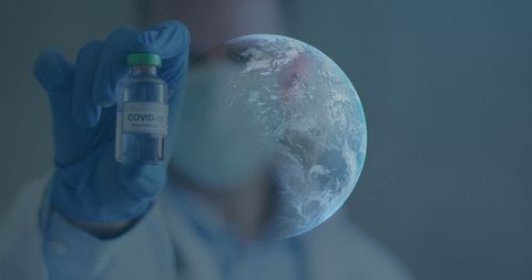 Healthcare Professional Presenting COVID-19 Vaccine With Earth Portal