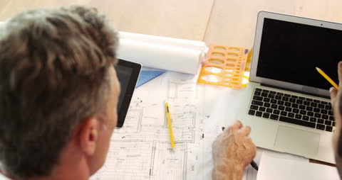 Architects Collaborating on Building Design