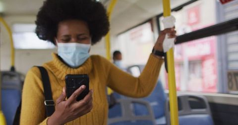 Businesswoman in Mask Using Smartphone on City Bus During Pandemic - Download Free Stock Images Pikwizard.com