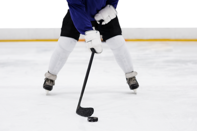 Transparent Ice Hockey Player in Mid-action With Hockey Stick and Puck - Download Free Stock Videos Pikwizard.com