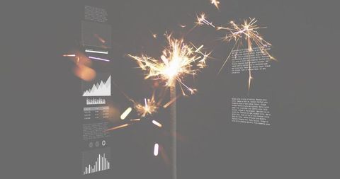 Single Sparkler Burning with Bokeh Trails and Data Overlay for Minimalist Celebration