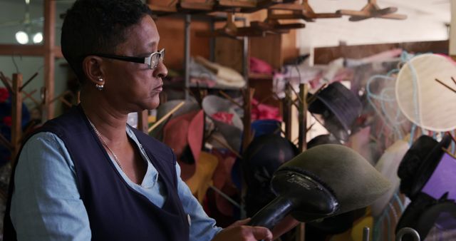 Skilled Milliner Creating Hat with Steamer in Workshop - Download Free Stock Images Pikwizard.com