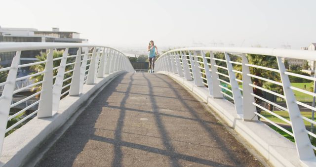 Young Woman Running on Bridge with Handrails in Urban Park - Download Free Stock Images Pikwizard.com