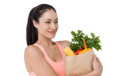 slim woman holding paper bag with nutritious vegetables and greens - Download Free Stock Videos Pikwizard.com