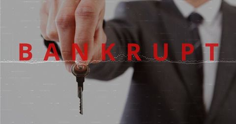 Handing over key with bankrupt overlay representing corporate bankruptcy and asset loss