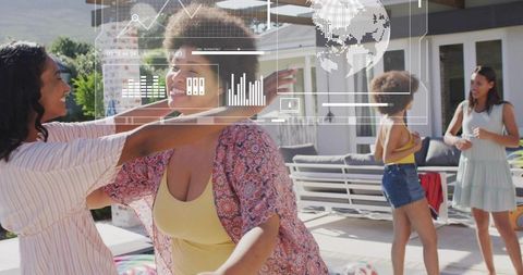 Friends hugging on sunny backyard patio with futuristic hud overlay for tech lifestyle