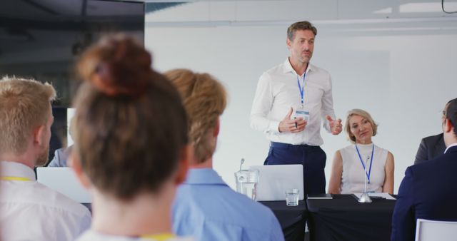 Business Presentation with Speaker and Audience in Modern Conference Room - Download Free Stock Images Pikwizard.com