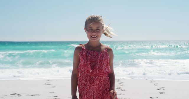 Smiling Girl in Red Dress Enjoying Sunny Beach Day - Download Free Stock Images Pikwizard.com