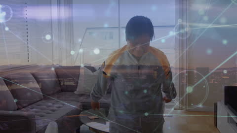 Senior Woman in Living Room with Networking Concepts