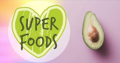 Healthy diet concept with avocado and super foods text