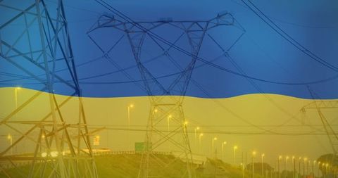 Ukrainian Flag Superimposed on Electrical Pylons Symbolizing Energy Crisis