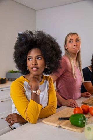 Diverse Friends Preparing Vegetables Together for Cooking