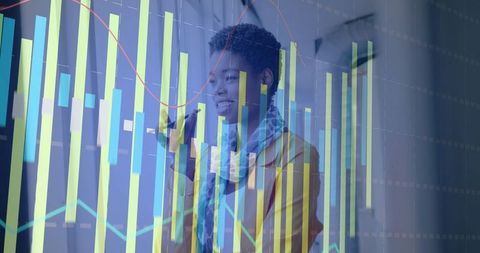 Businesswoman analyzing data with interactive charts in modern office