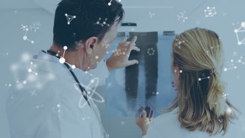 Doctors Analyzing X-Ray with Scientific Data Visualization