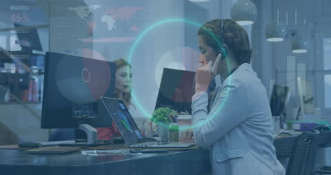 Businesswoman Analyzing Financial Data with Hologram Interface