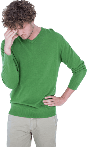 Thoughtful Man in Green Sweater Deep in Transparent Contemplation