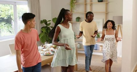 Friends Socializing in Modern and Cozy Home Interior Gathering