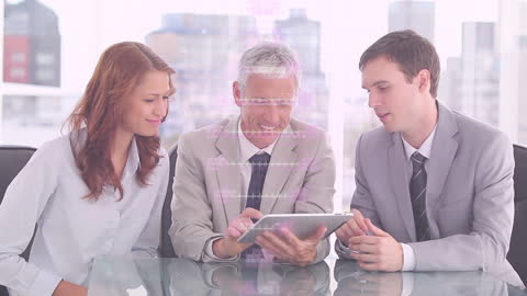 Business Team Collaborating with Tablet in Modern Office