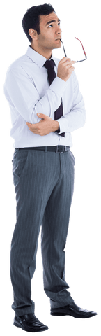 thoughtful mixed race businessman holding glasses on transparent background - Download Free Stock Videos Pikwizard.com