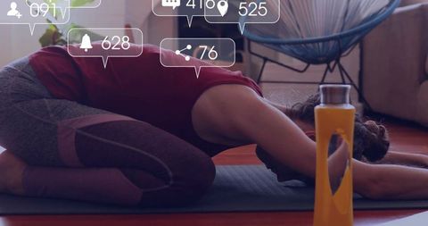 Balanced wellness at home: woman practicing child's pose