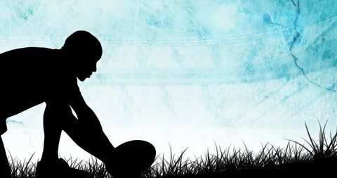 Silhouette of Rugby Player Preparing in Vibrant Blue Overlay - Download Free Stock Images Pikwizard.com
