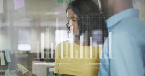 businesspeople analyzing financial data with technology overlay - Download Free Stock Images Pikwizard.com