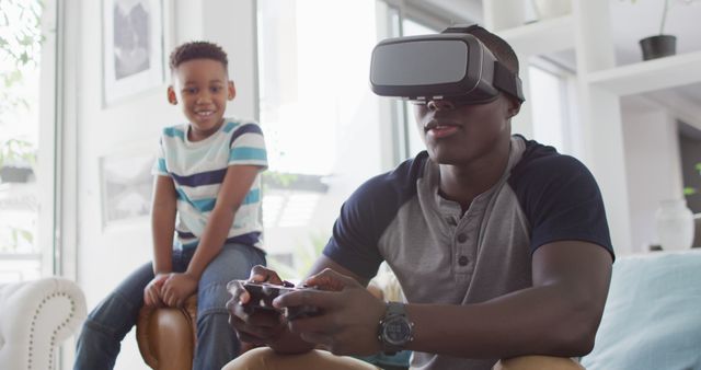 Teen Using Virtual Reality Headset, Young Boy Watching Enthusiastically - Download Free Stock Images Pikwizard.com