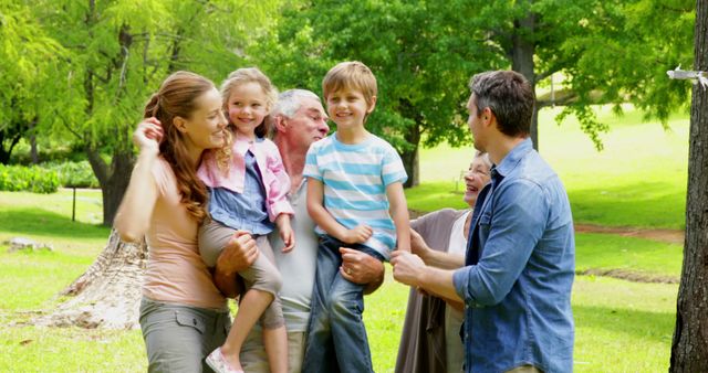 Happy Multigenerational Family Relaxing at Park on Summer Day - Download Free Stock Images Pikwizard.com