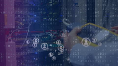 Technician Monitoring Data Flow in Server Room