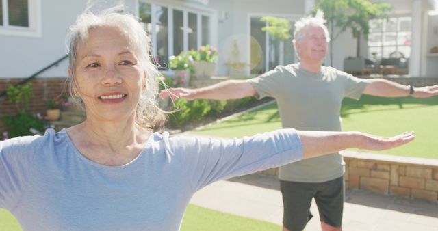 Senior couple practicing outdoor yoga in backyard garden - Download Free Stock Images Pikwizard.com