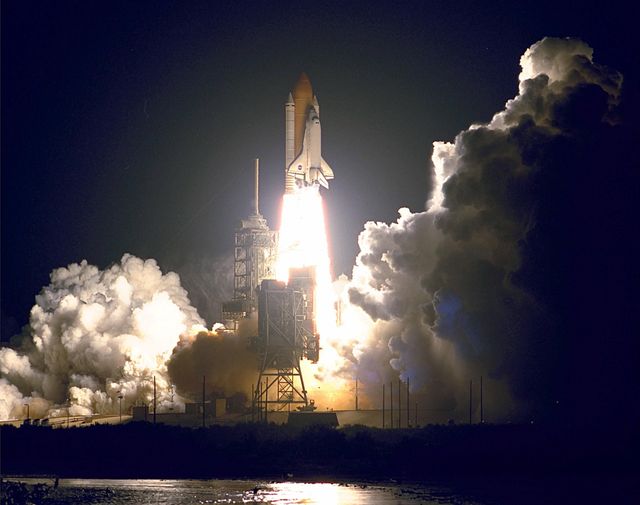 This image captures the dramatic night launch of the Space Shuttle Endeavour from Kennedy Space Center on December 4, 1998, for mission STS-88. The launch symbolizes innovation, scientific achievement, and the assembly of the International Space Station. This visual is ideal for use in educational materials, articles on space exploration, presentations on NASA missions, and inspiring posters depicting space travel.