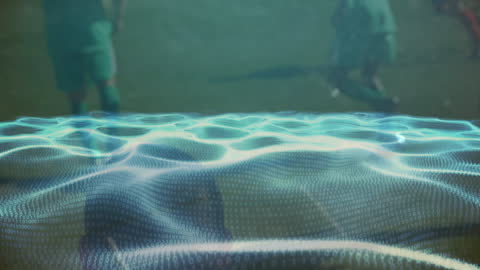 Digital Waves with Binary Code Overlay Diverse Football Action